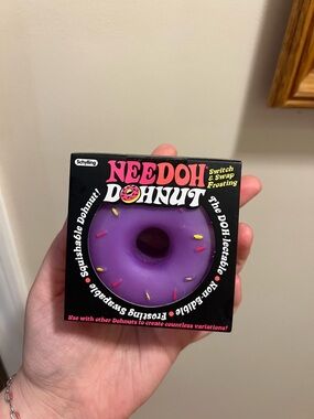Needoh Donut Squishy Toy - Black Box with Pink/White Logo